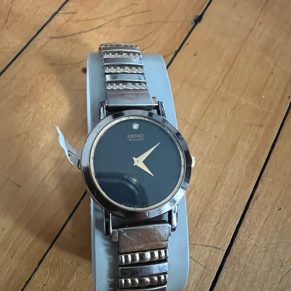 Seiko Black and Silver Wearable Watch